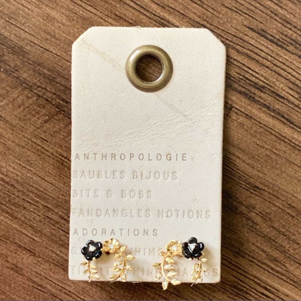 Anthropologie floral earring in gold and black